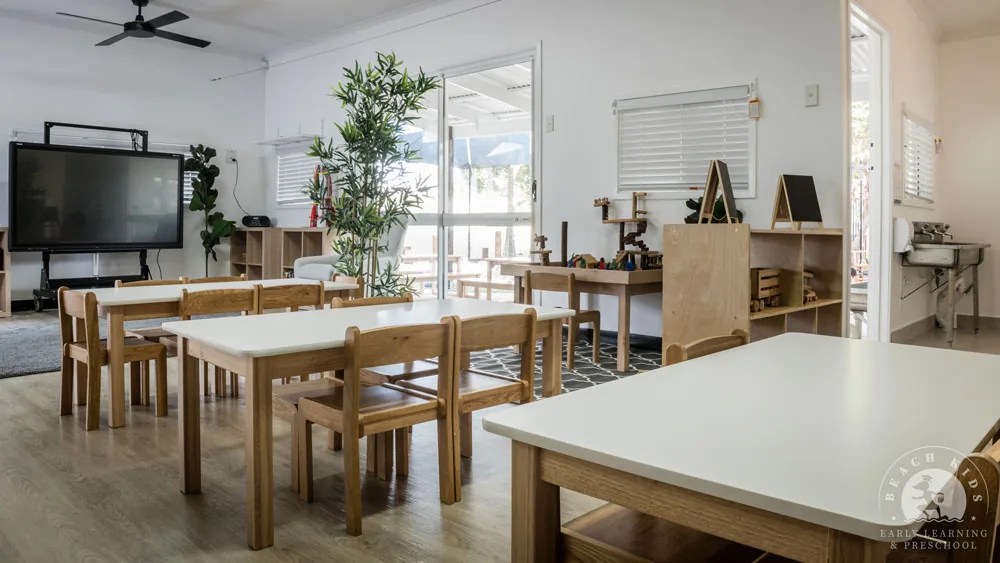 The Preschool classroom at Beach Kids Cabarita with tables set up for the day
