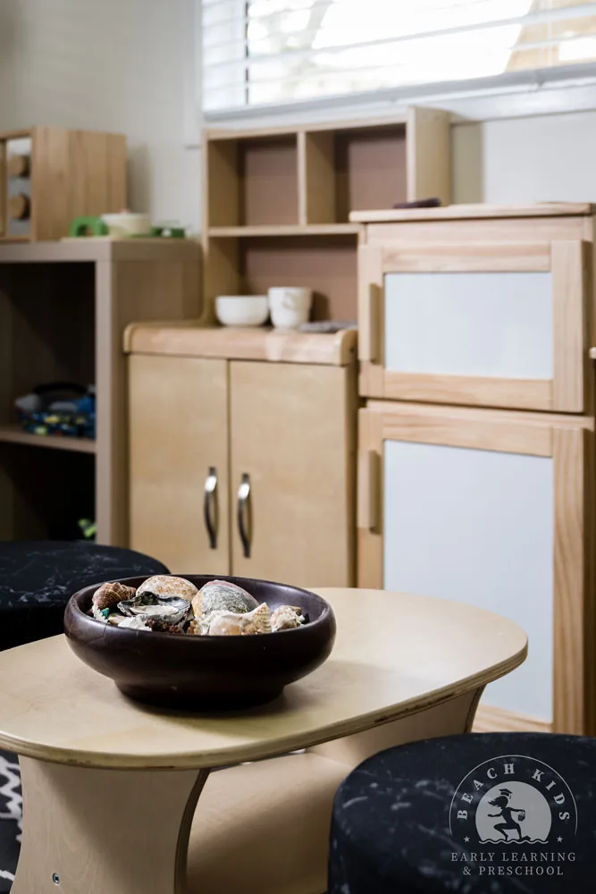 Timber play furniture and natural materials in a Beach Kids classroom
